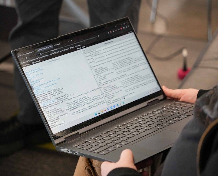 Laptop showing codes for cybersecurity concept