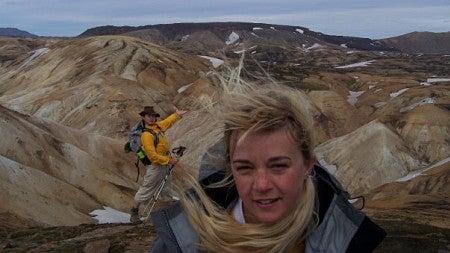 erickson standing in front of the Laugavegur, a trail in Iceland