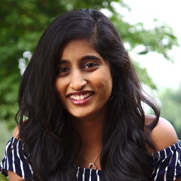 female student posing for outdoor portrait