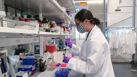 Sanjana Basak working in a lab on a research project